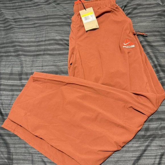 Nike ACG Black Iguana Men’s 2 In 1 Pants HJ2891-245 Men’s Size S Desert Orange - Picture 1 of 9
